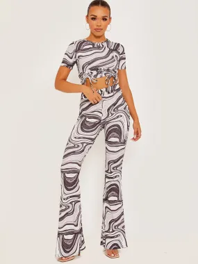 Shayla Marble Print Ribbed Flared Trousers In Grey