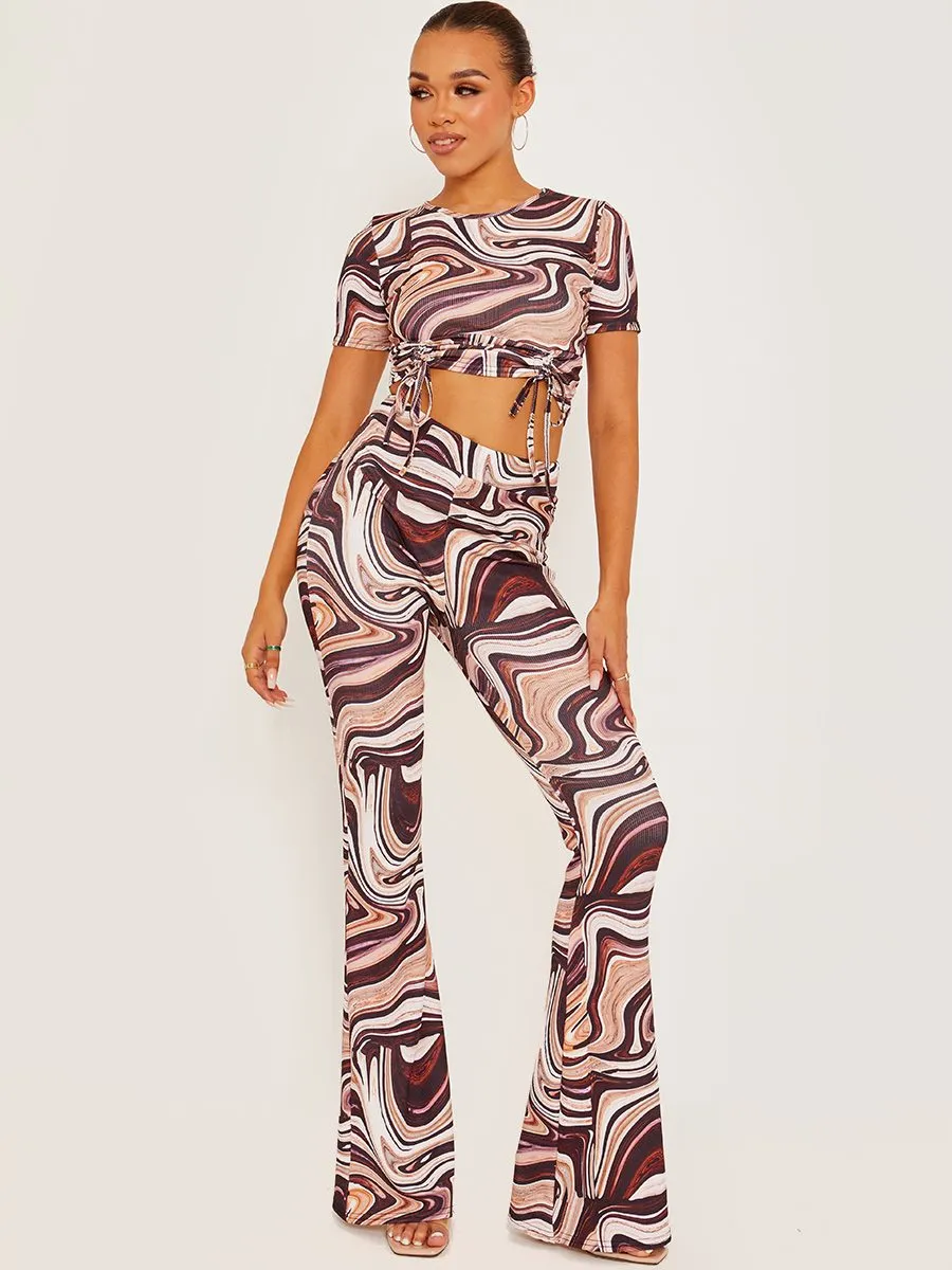 Shayla Marble Print Ribbed Flared Trousers In Stone